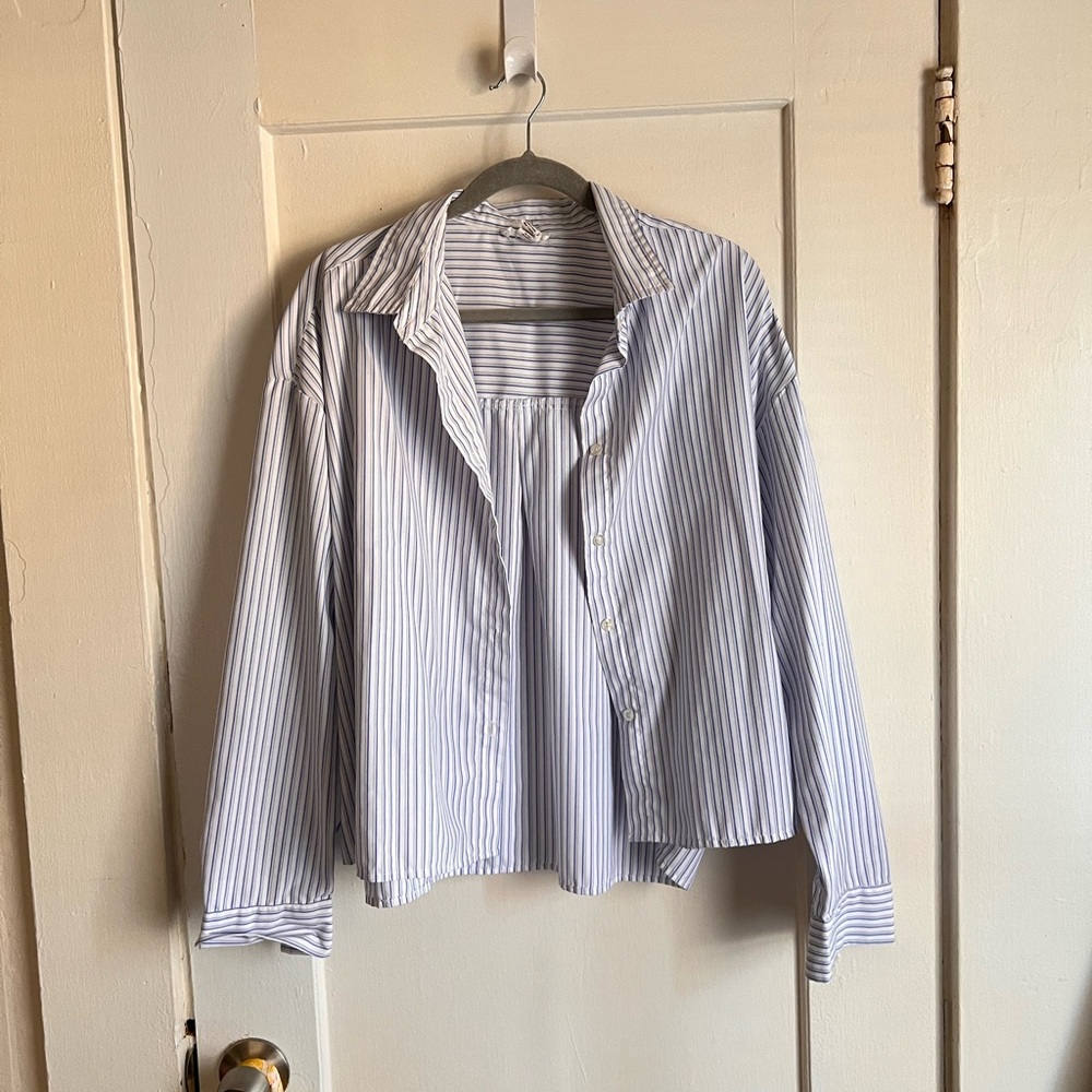 women’s blue and white striped button down